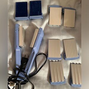 Conair shiny styling tool.  Comes with five interchangeable plates.